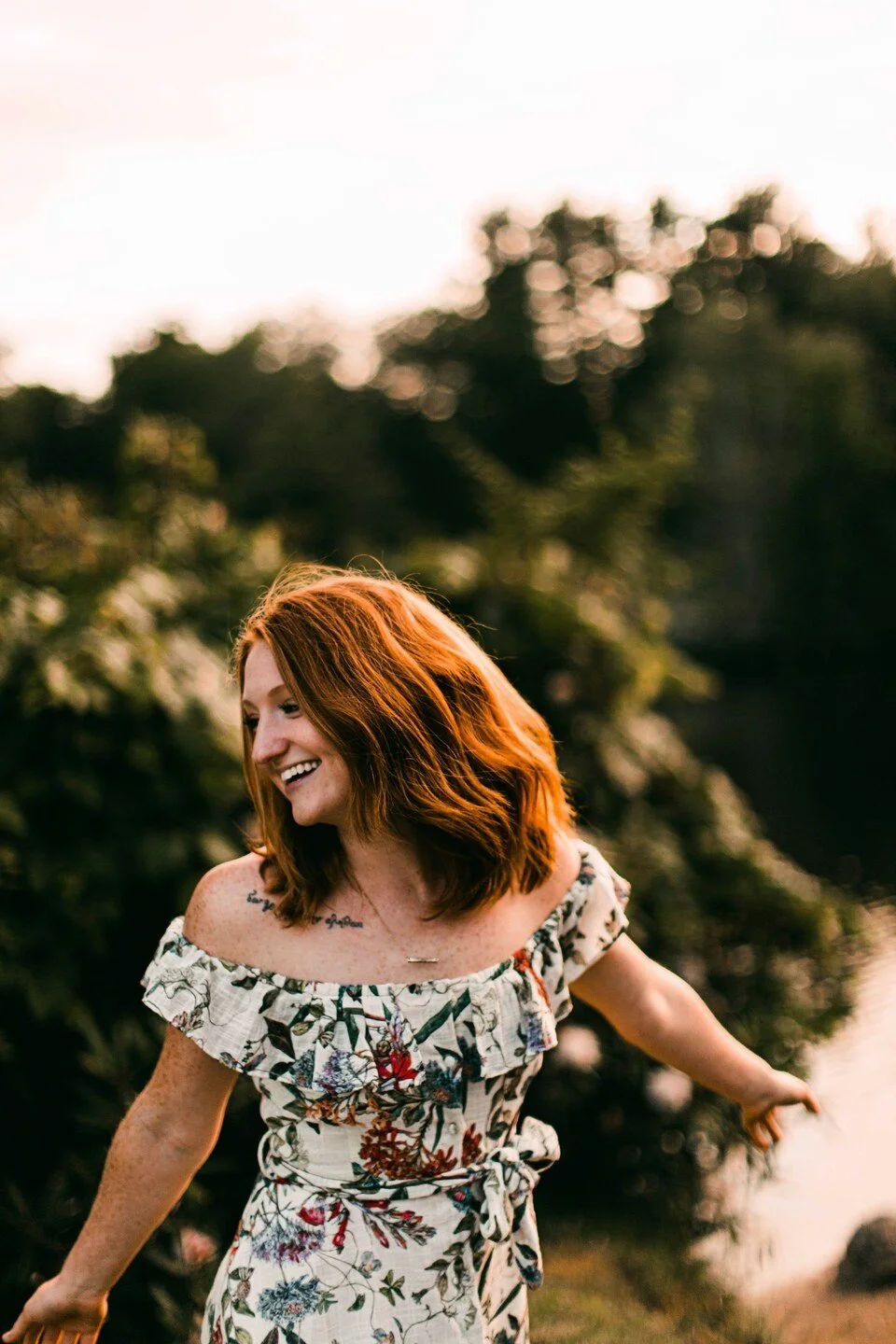 young woman prancing in a park