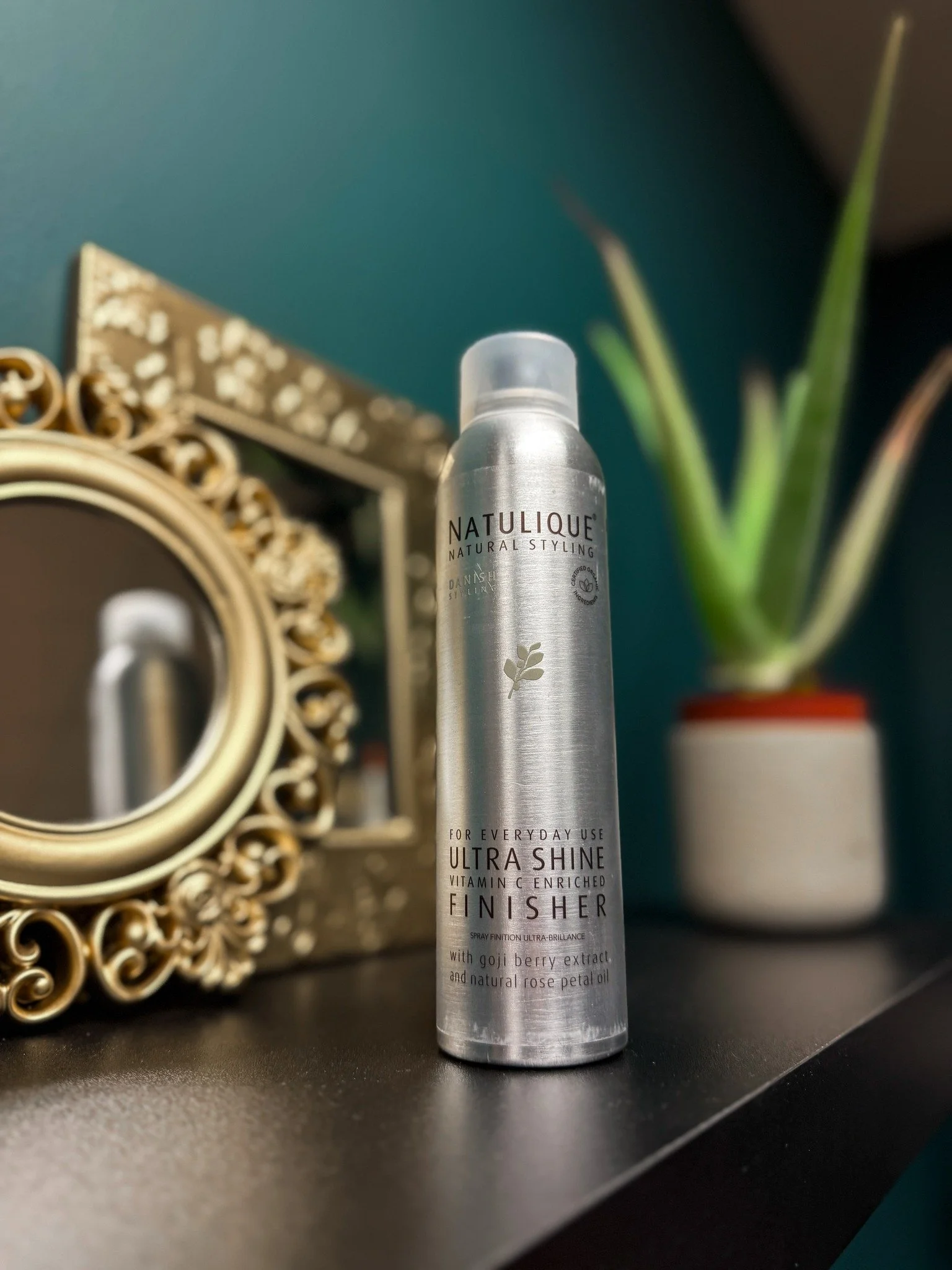 Day 2 of our 12 Days of Glow: Natulique Ultra Shine Finishing Spray = holiday hair goals 💫