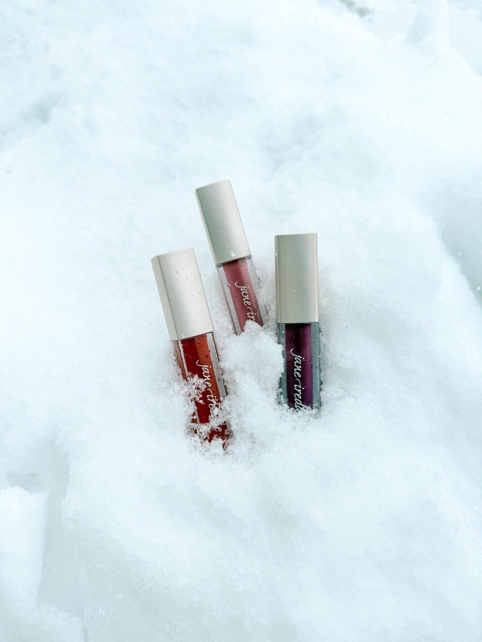 Day 3 of our 12 Days of Glow:  Jane Iredale lip colors for under the mistletoe 💋

Shades Pictured:
❤️ Siren
🩷 Flush
💜 Juicy