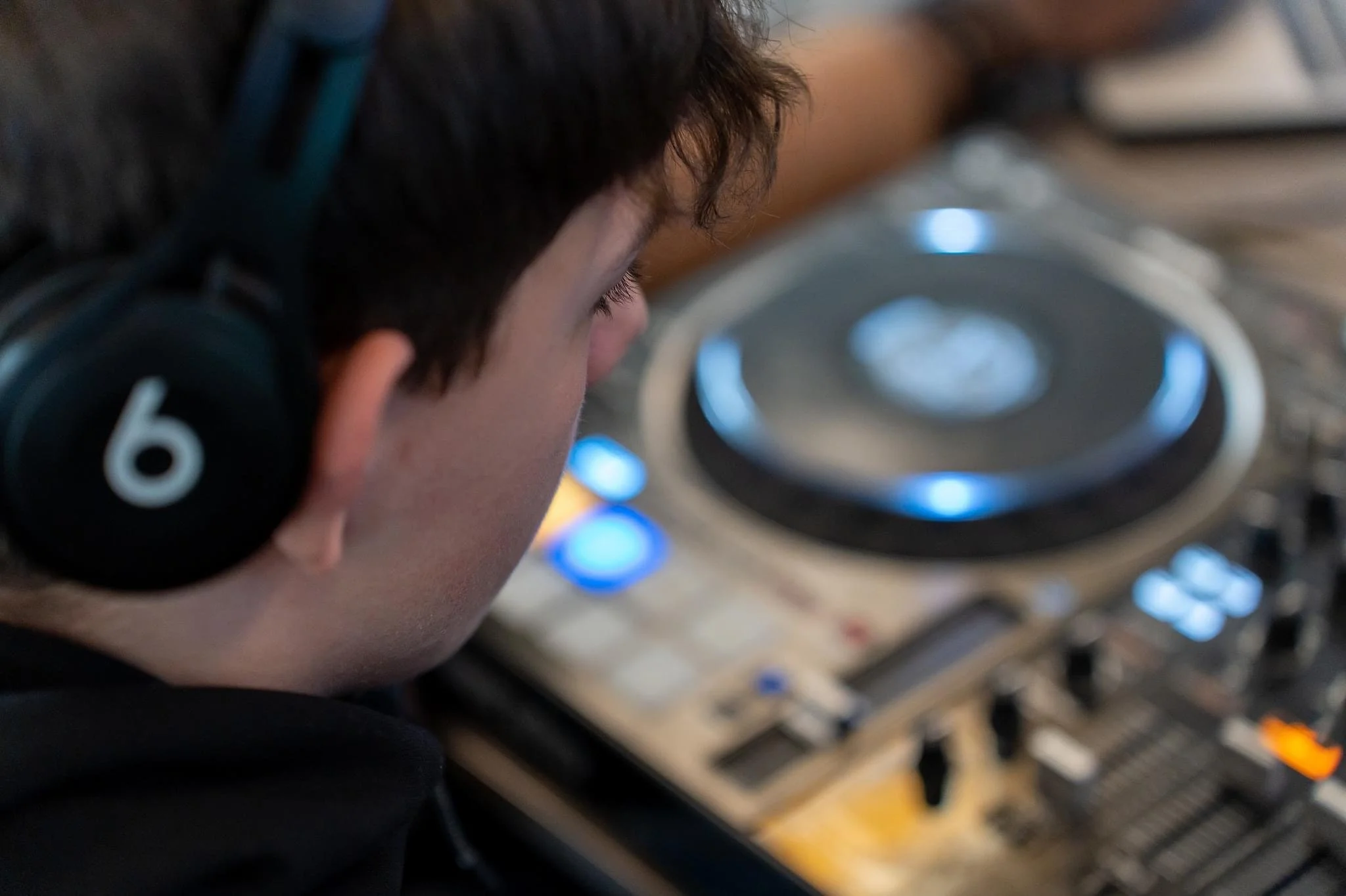 Pupil having a DJ Workshop