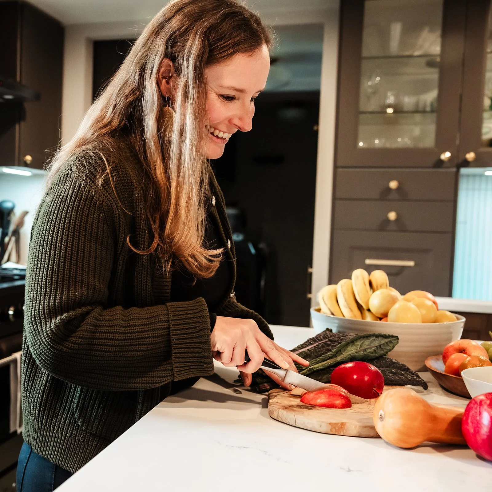 Karina Wenker, Nutritionist, in the kitchen, preparing a meal