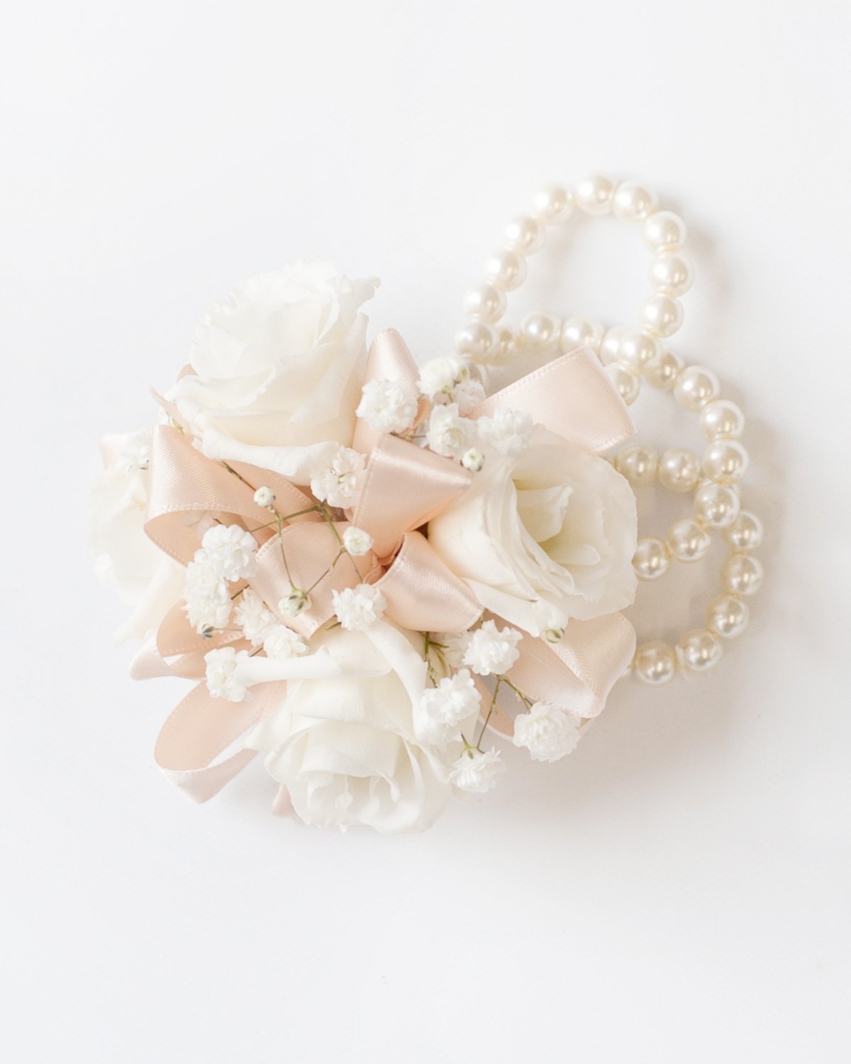 All of our wrist corsages come with an elastic pearl band so that they can be comfortably worn and look beautiful. 

Mother's can also opt for a mini bouquet to carry. 

So what can we create for your special day?

#daytonweddingflorist #daytonweddin
