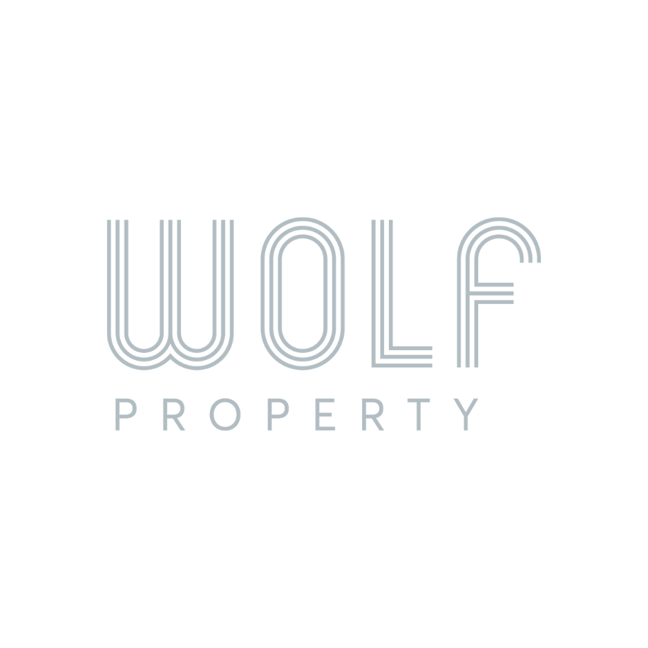 WOLF Property logo in light gray text on a white background.