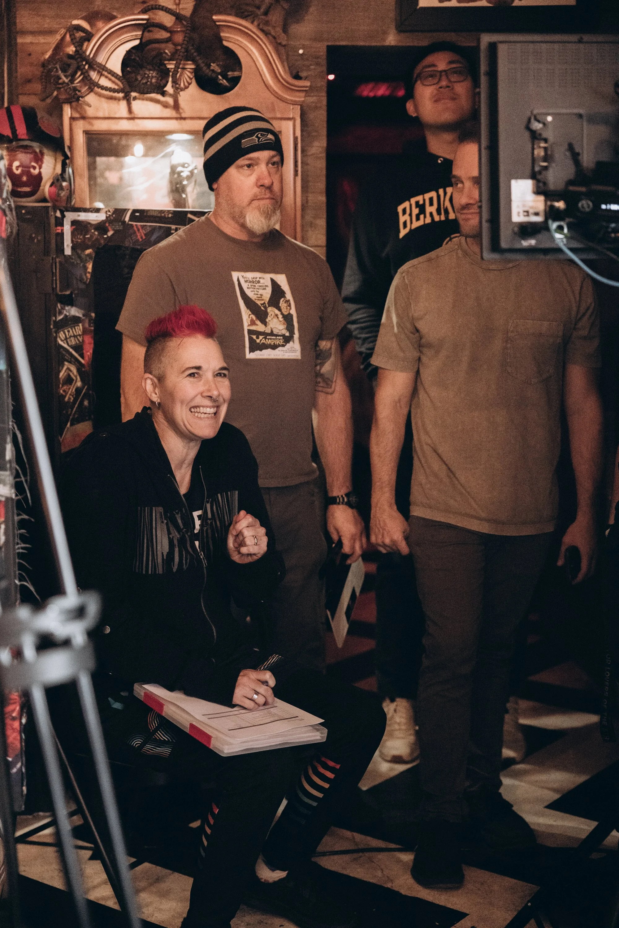 Writer/Director Ren gets excited about the scene as Gaffer Jim, DP Cody and PA Matthew work on the setup at 2 Fingers Social