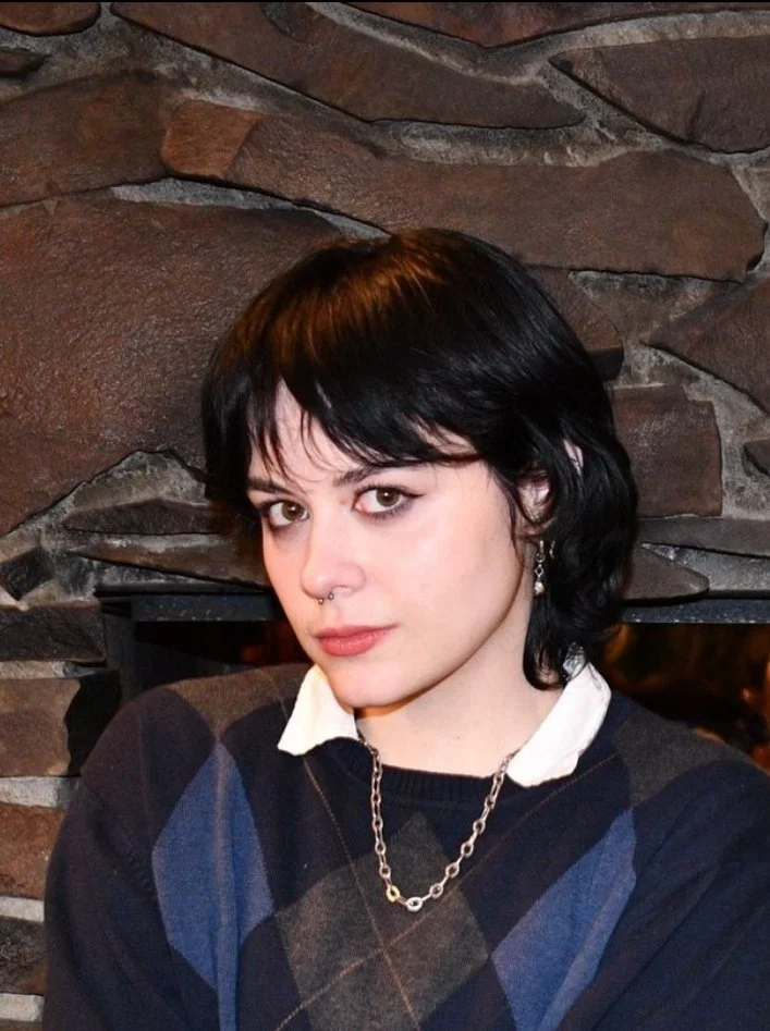 Ivy Votolato as "Andy"