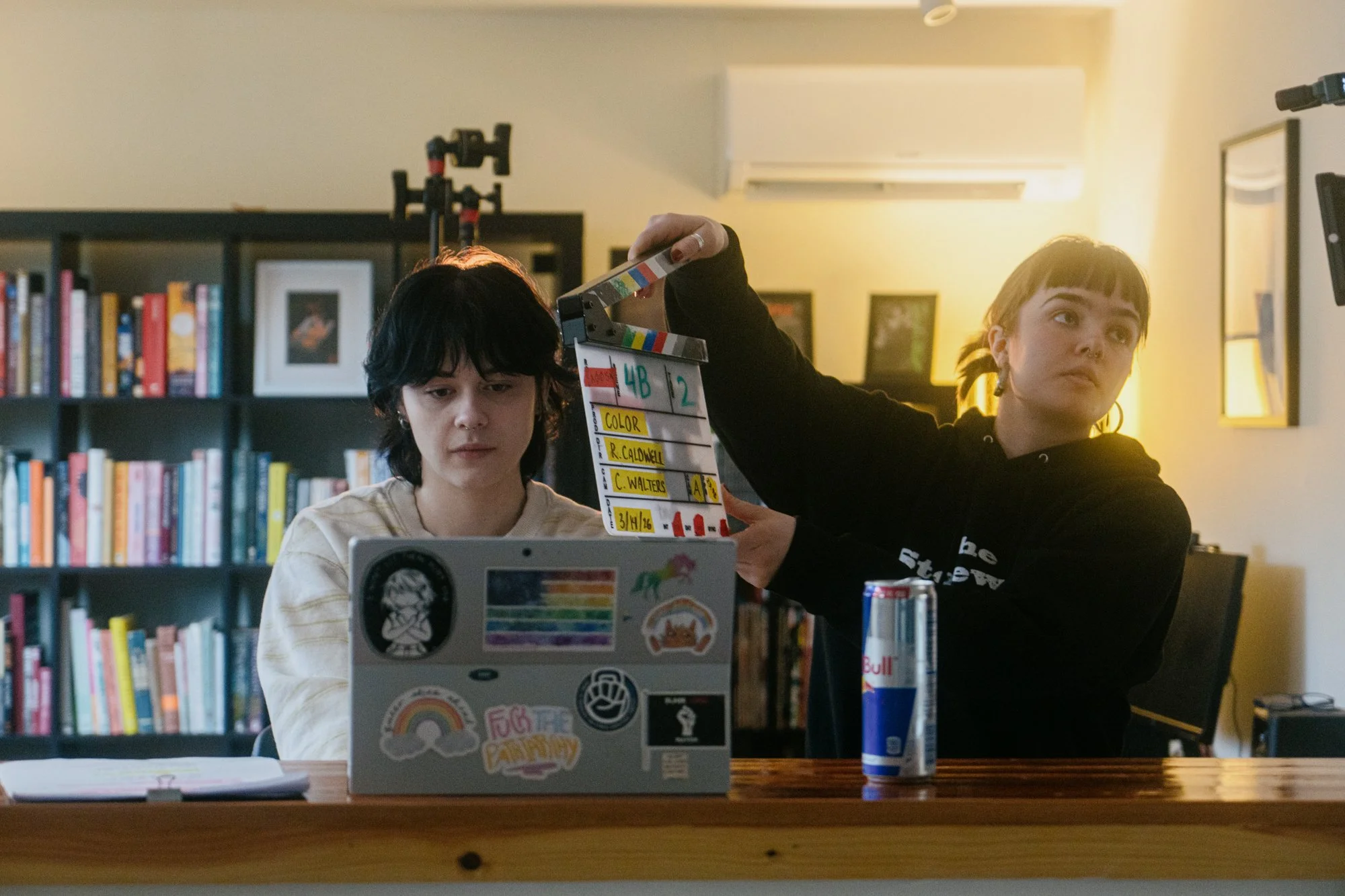 "Andy" (Ivy Votolato) and Grip Kendall prep for a take