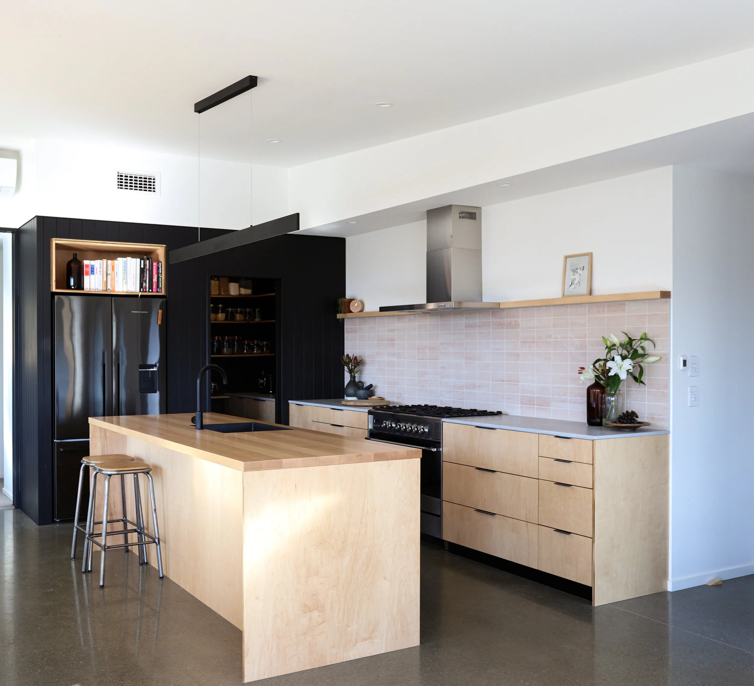 Custom kitchen with Maple veneer and a solid Maple timber