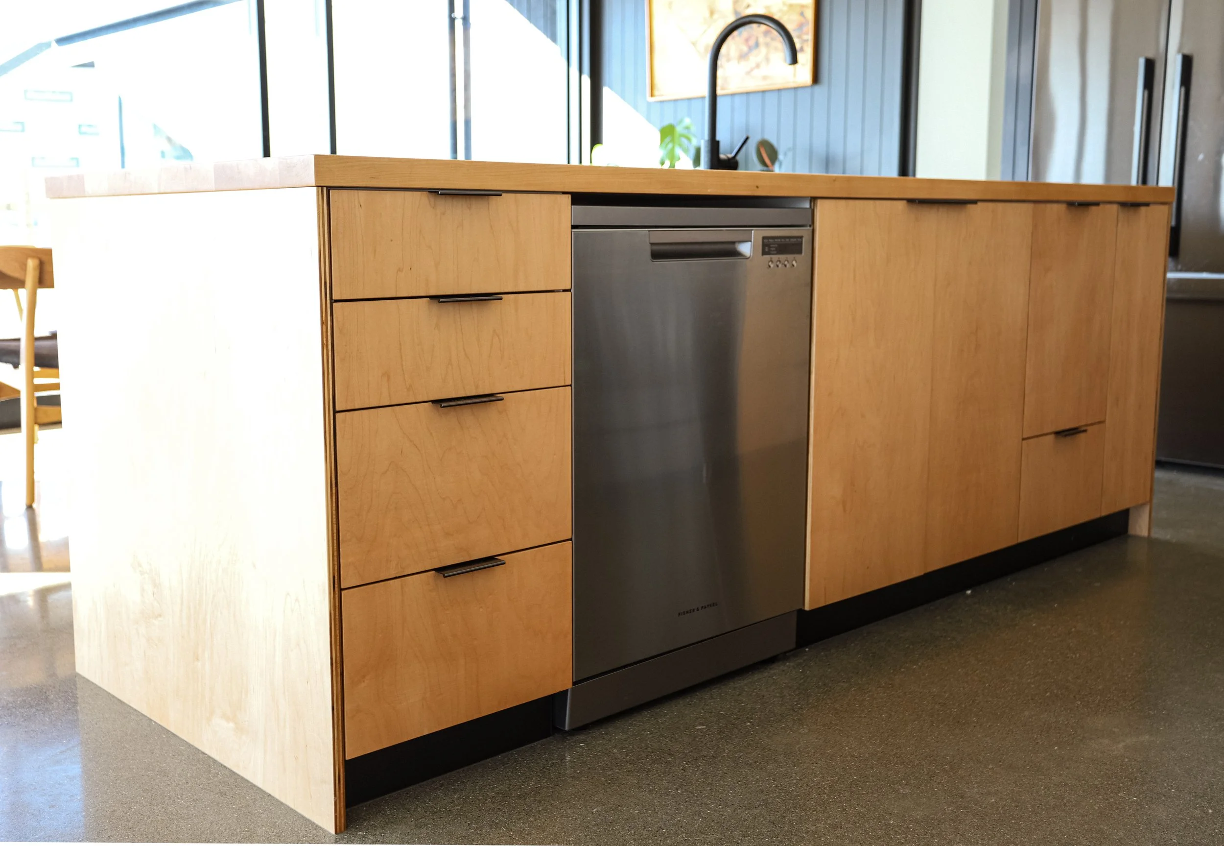 Custom kitchen with Maple veneer and a solid Maple timber