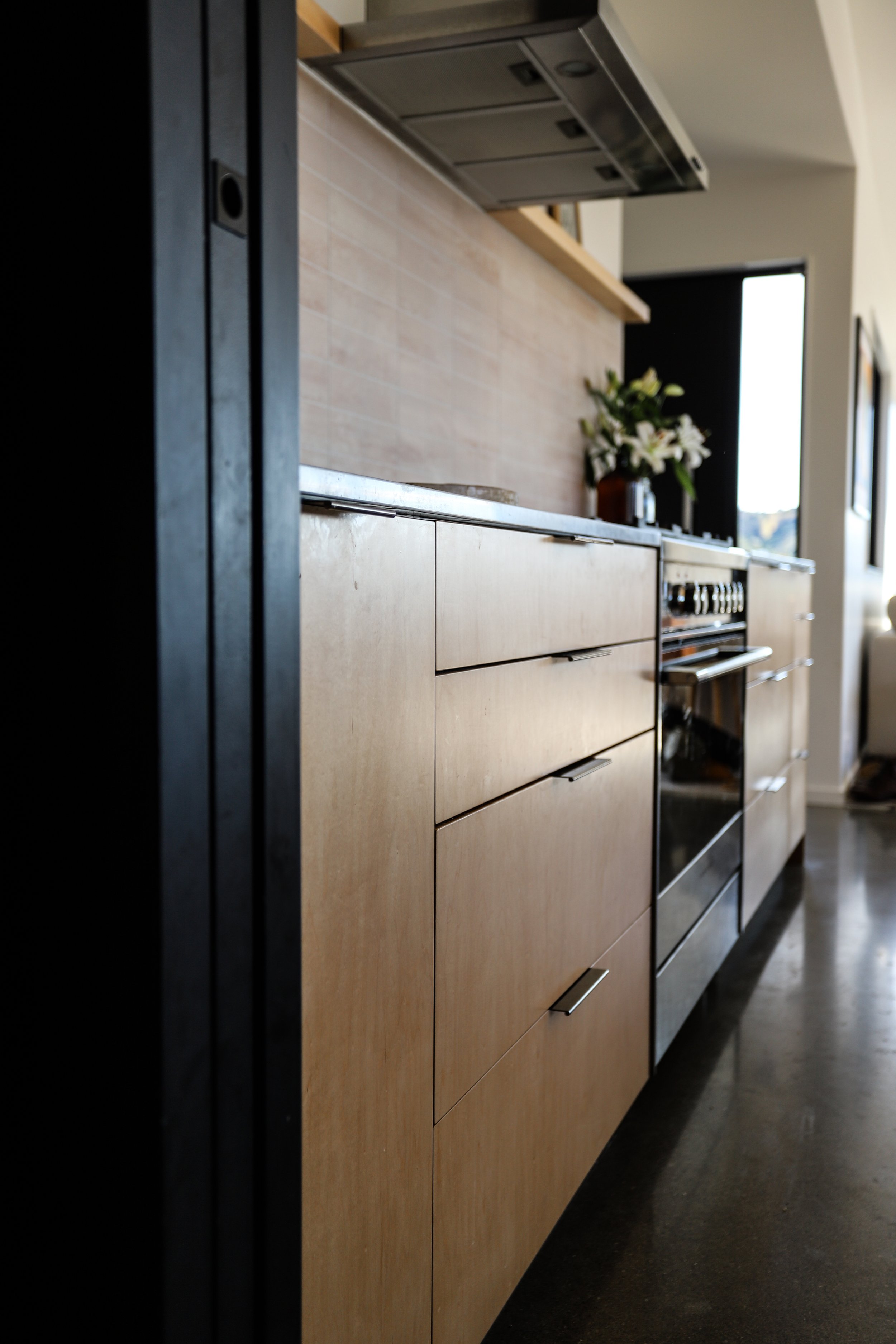 Custom kitchen with Maple veneer and a solid Maple timber