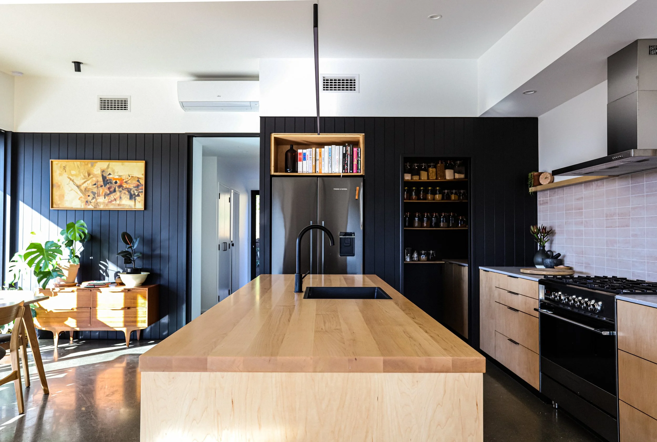Custom kitchen with Maple veneer and a solid Maple timber