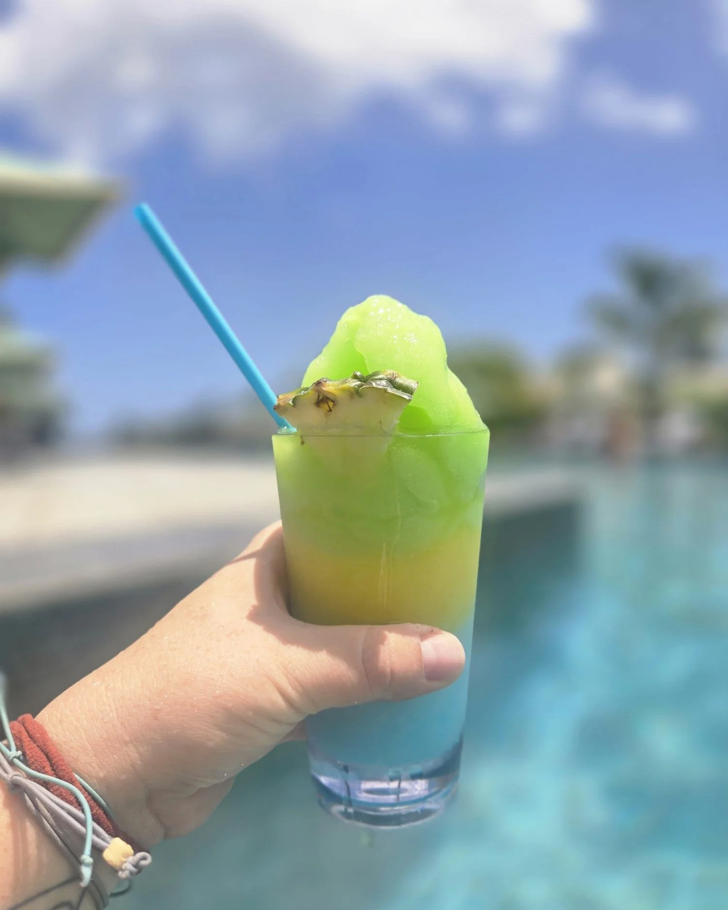 Visiting Sandals Saint Vincent?💚💛💙

Celebrate your trip with a fruity cocktail poolside.🍹 Ask for the Flag Drink - a green, yellow, and blue layered frozen cocktail sure to keep you cool in the hot sun!☀

Are you ordering a frozen drink or someth