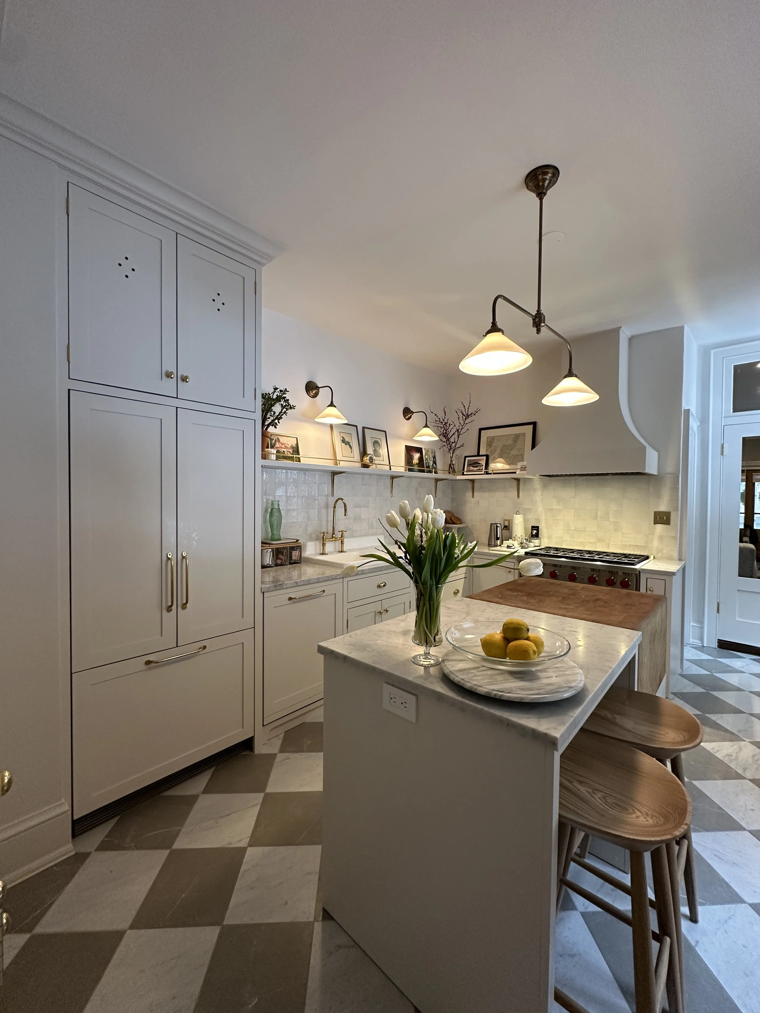 Custom British Kitchen Traditional with shaker cabinets and marble counter