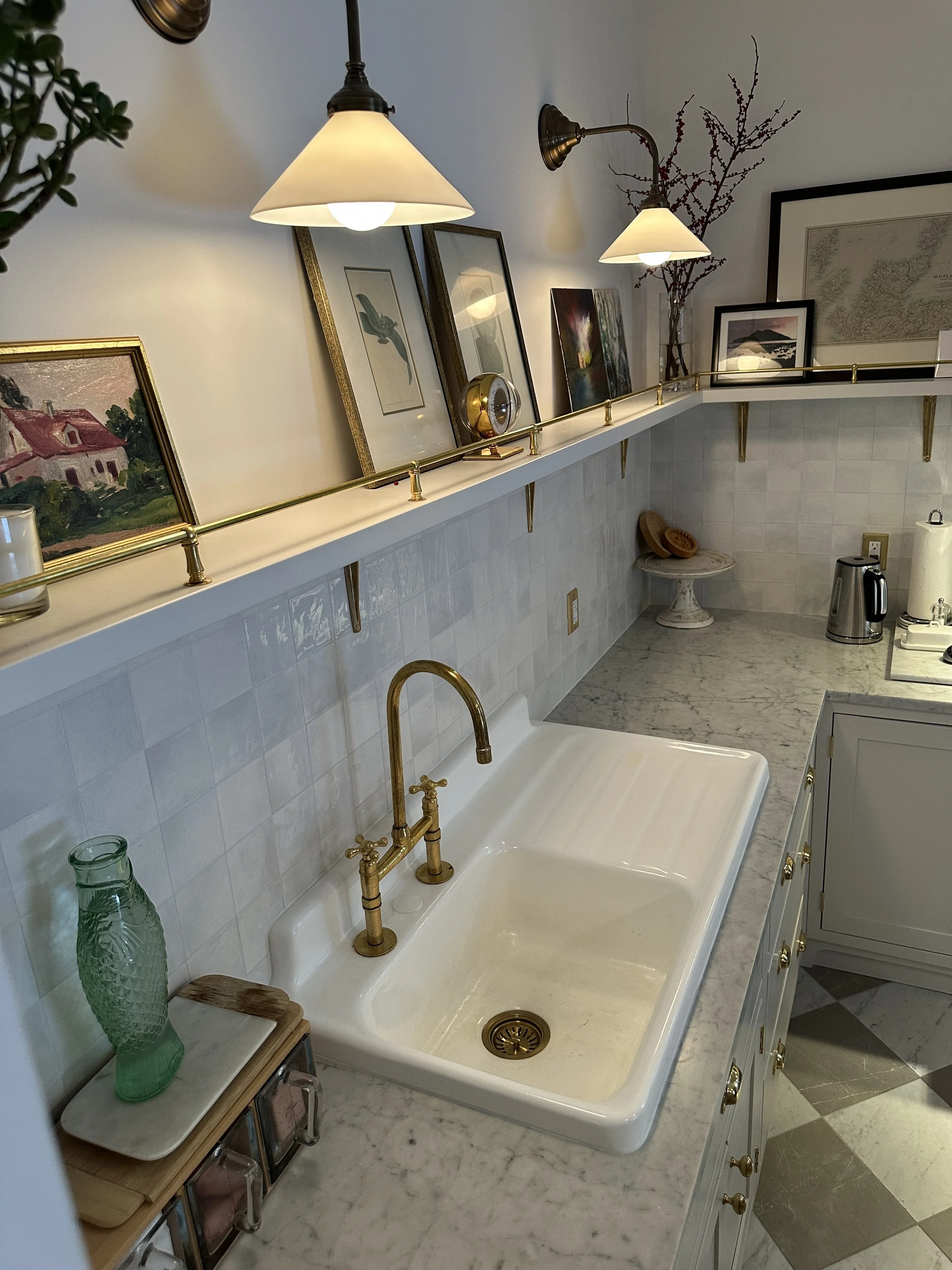 refinished cast iron sink with morrocan brass faucet 
