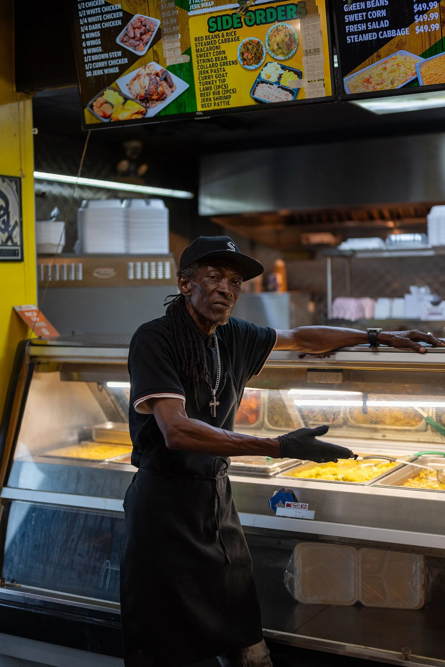 Tonal Simmons, for "Best Place to Get Curry Chicken for a Last-Minute Gay Wedding: Jamaican Jerk King" by Ricardo Gamboa