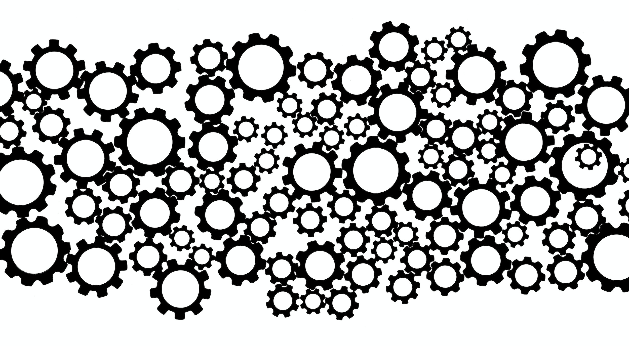 Black and white illustration of interconnected gears.