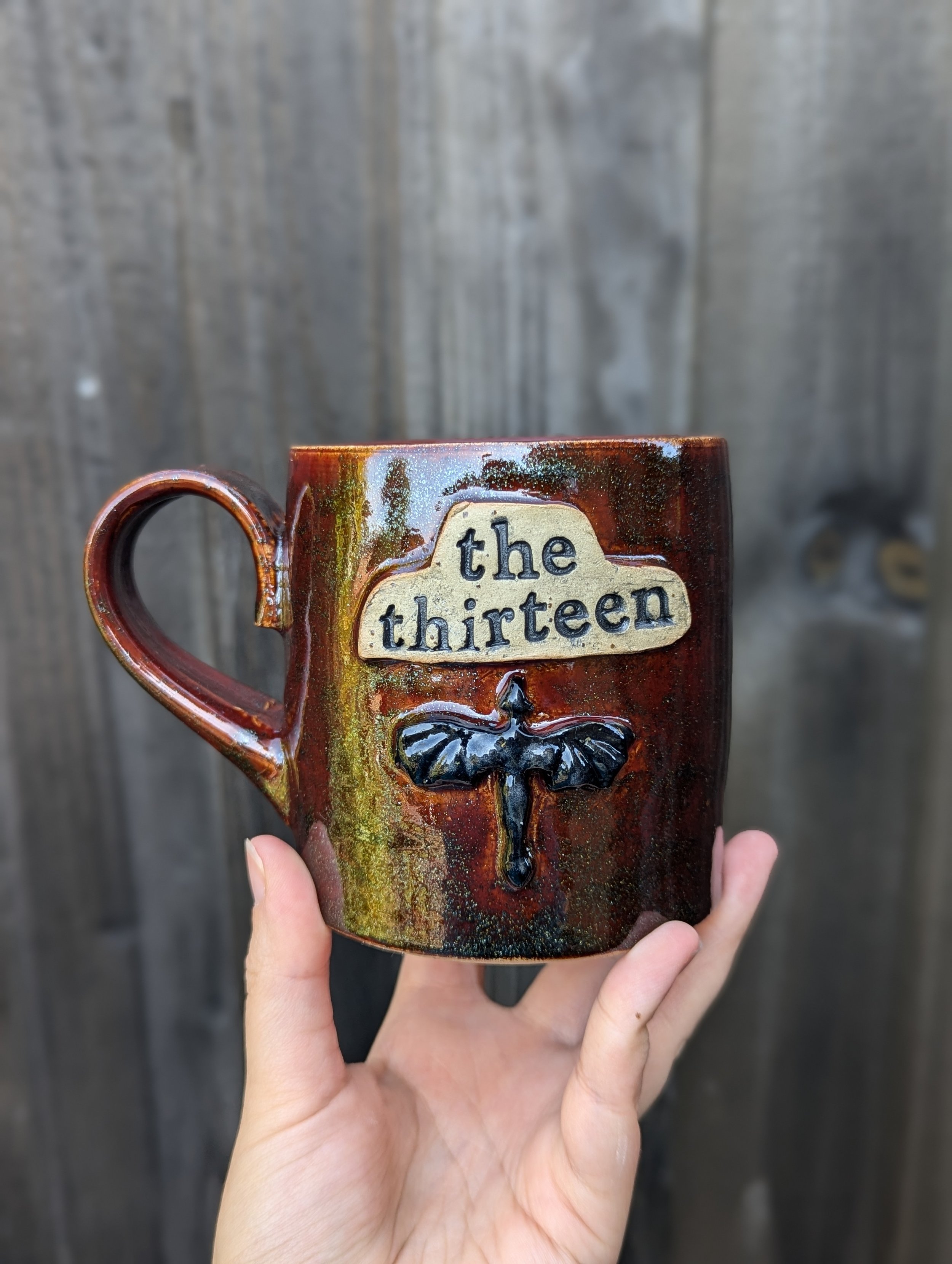 The thirteen mug based on the throne of glass books