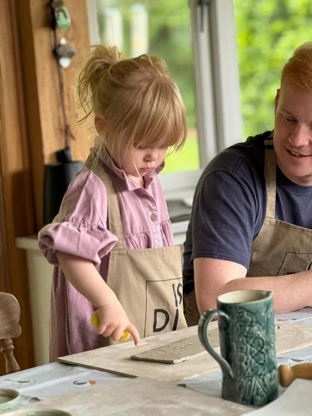Child with clay in Sway