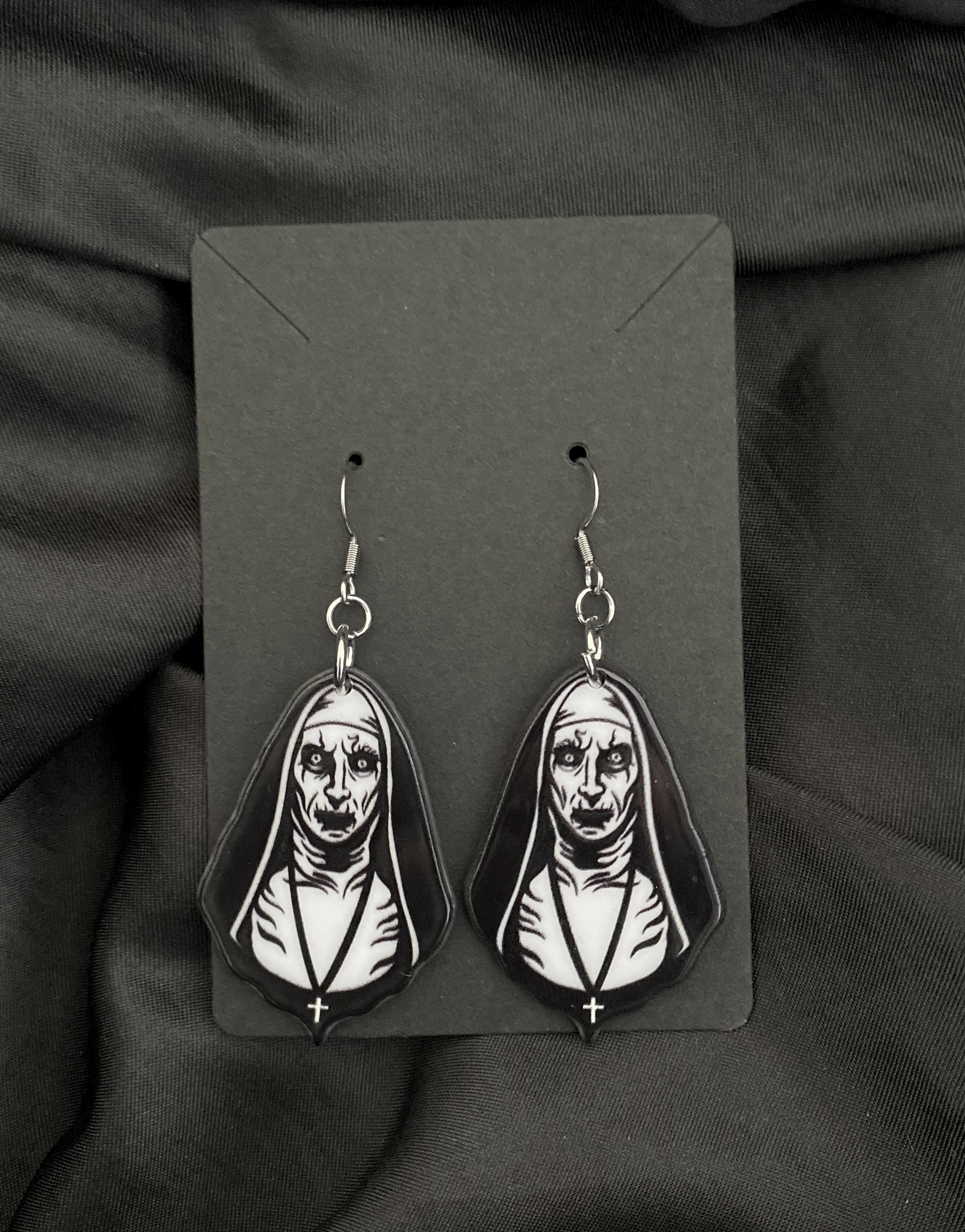 the nun earrings