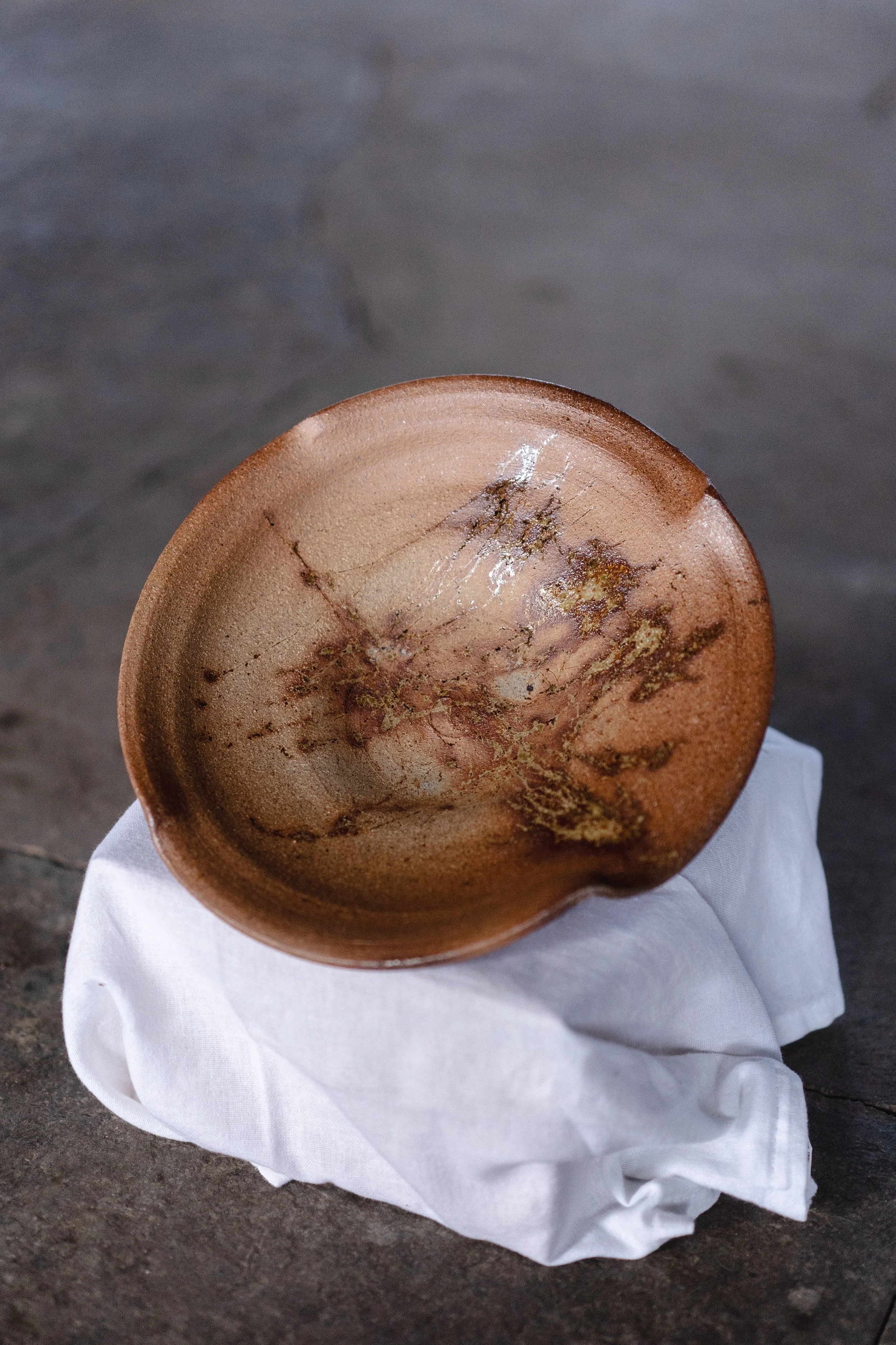 Wood-fired plate with a lavender glaze, 2025 