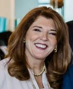 Susan Tellone professional headshot in natural light, educator and suicide prevention specialist.