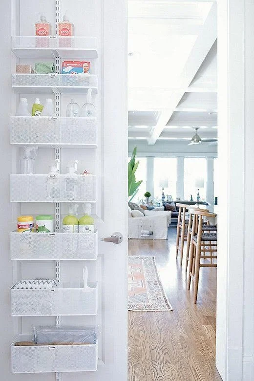 Maximize your closet space with this sleek over the door storage solution from the container store