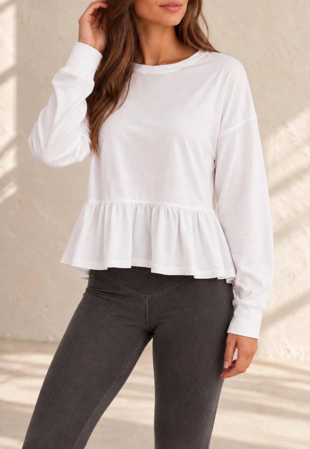 The Peplum Long Sleeve in White