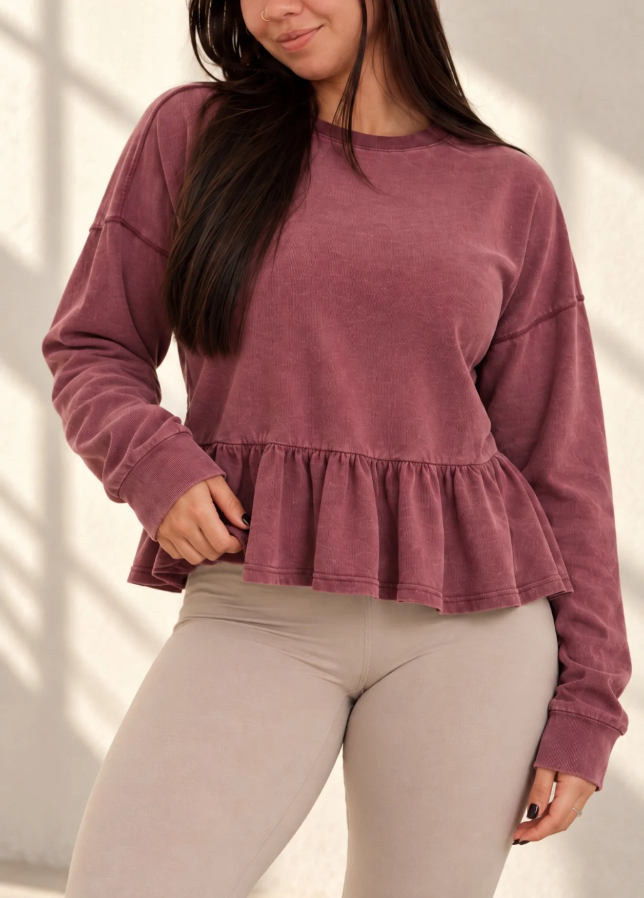 The Mineral Wash Peplum Long Sleeve in Dark Cherry
