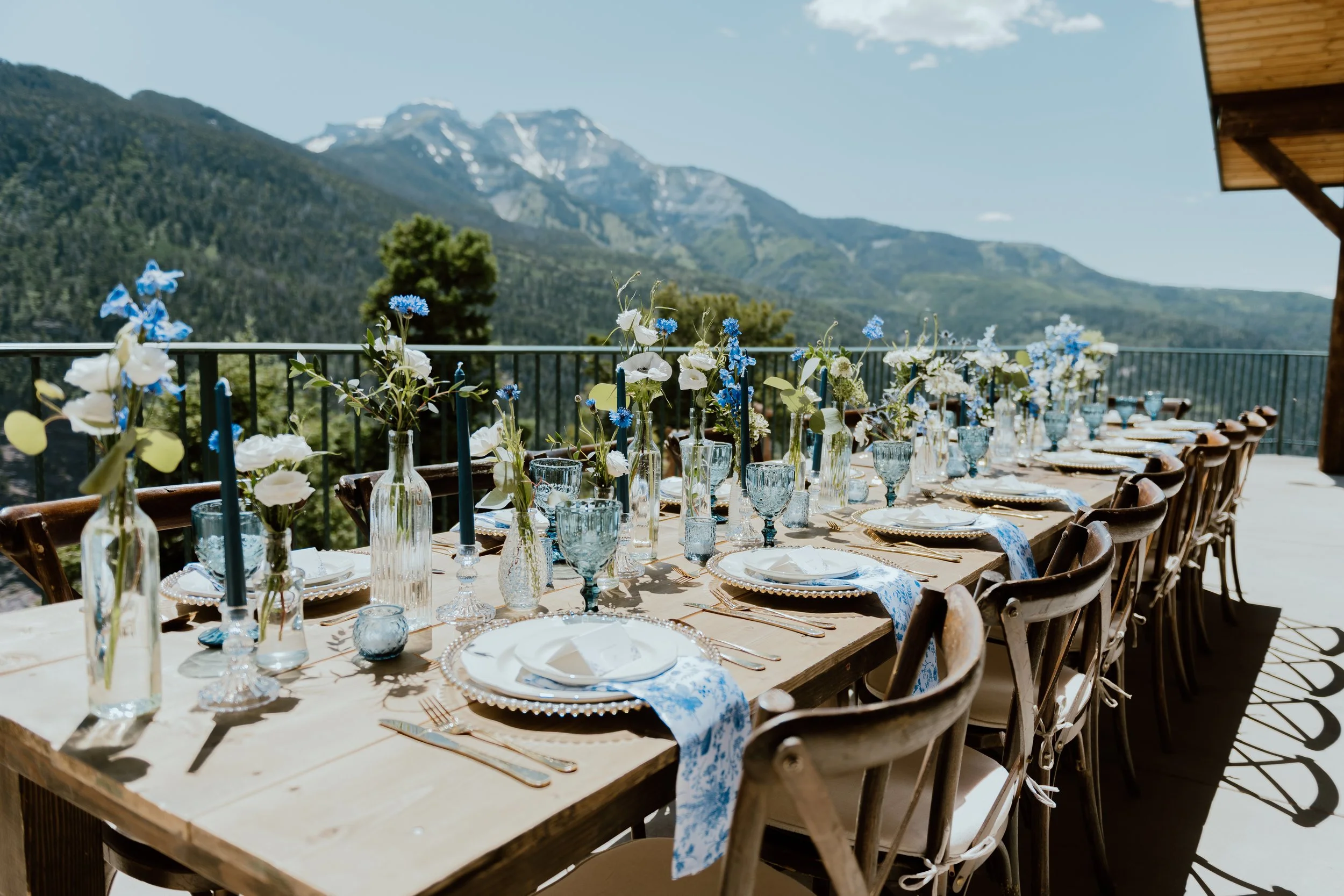 Bud vases set at mountain table