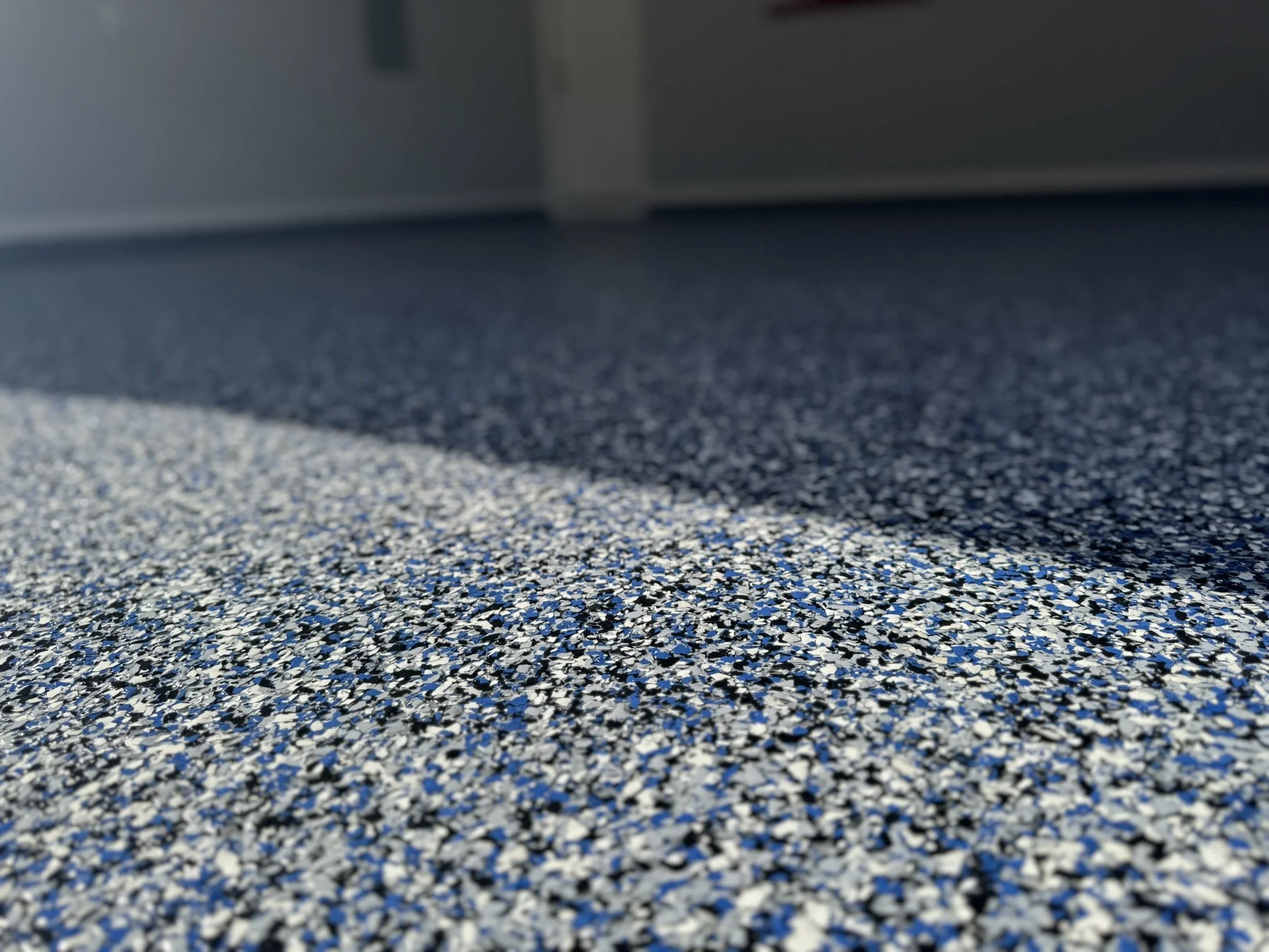 Flake Flooring — Epoxy vs. Polyaspartic — What Is The Difference?