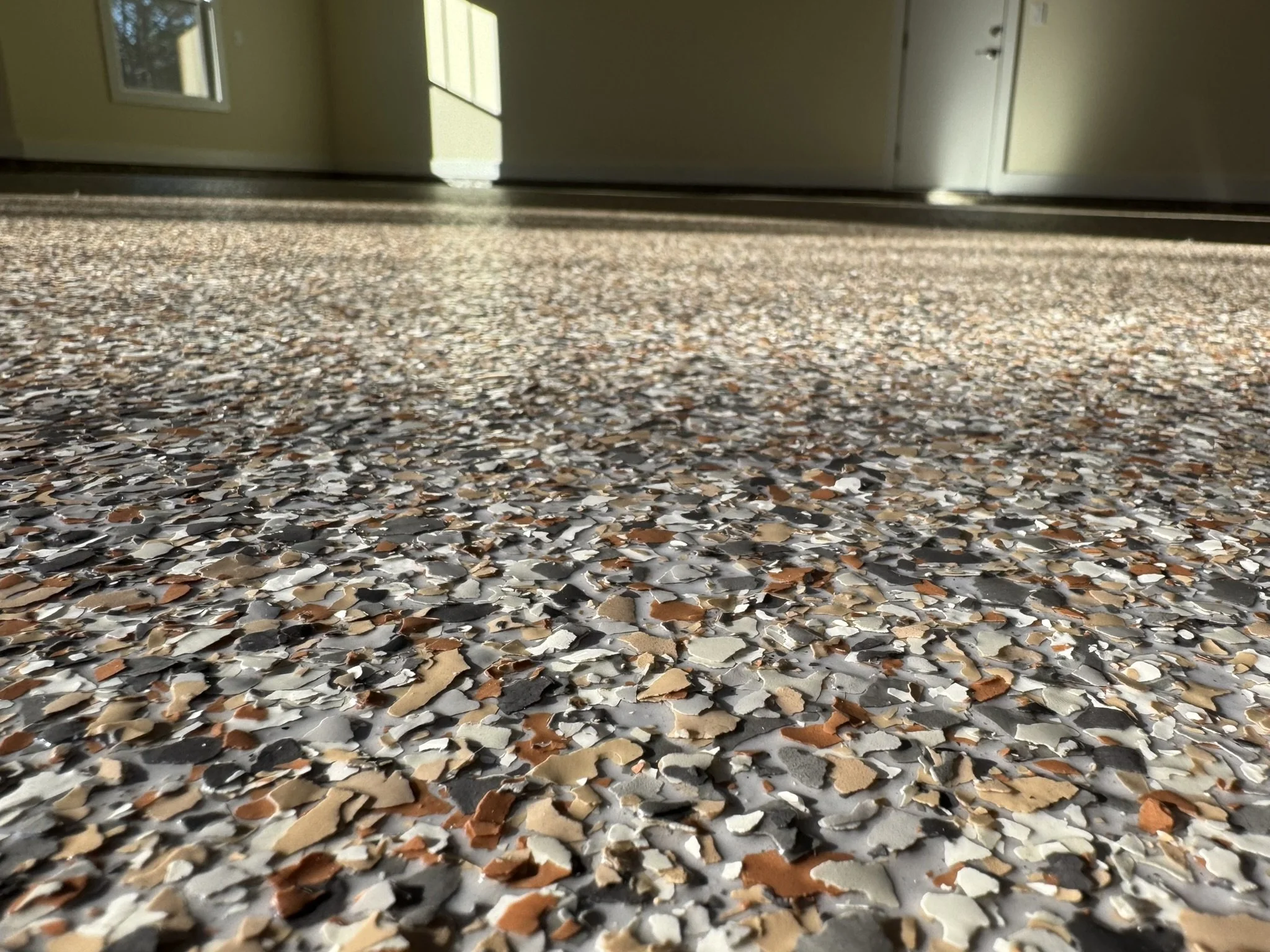 Close-up of epoxy flake floor in West Union, South Carolina