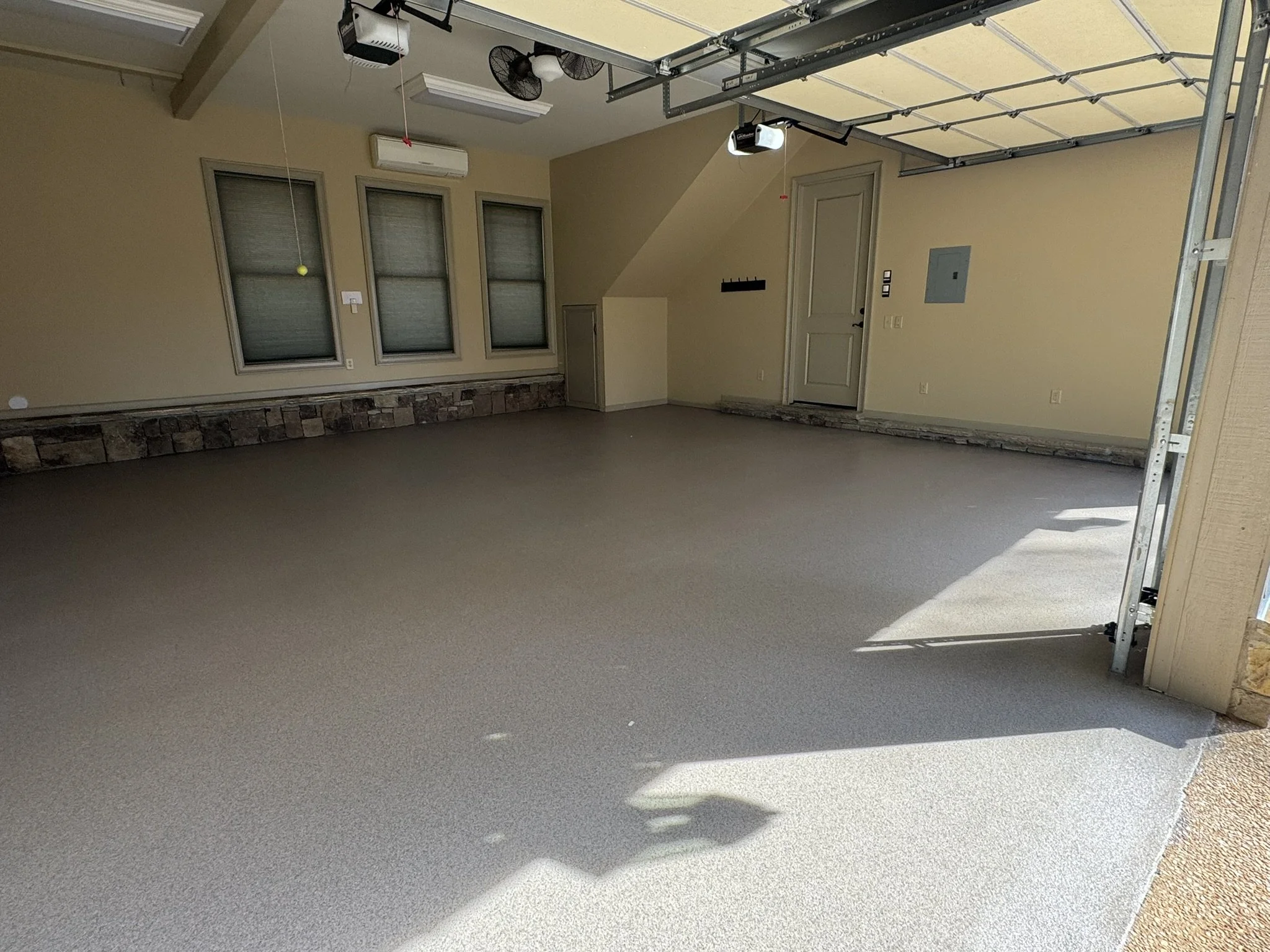Newy installed epoxy quartz flooring in Currahee Club in Toccoa, Georgia