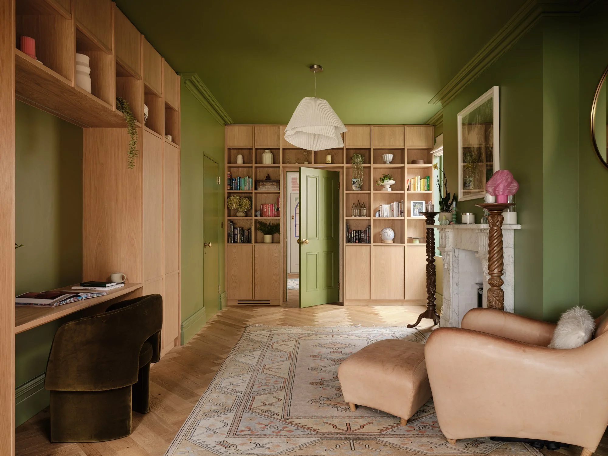 Green-painted library with bespoke oak joinery and a desk, Cromwell Road, Teddington