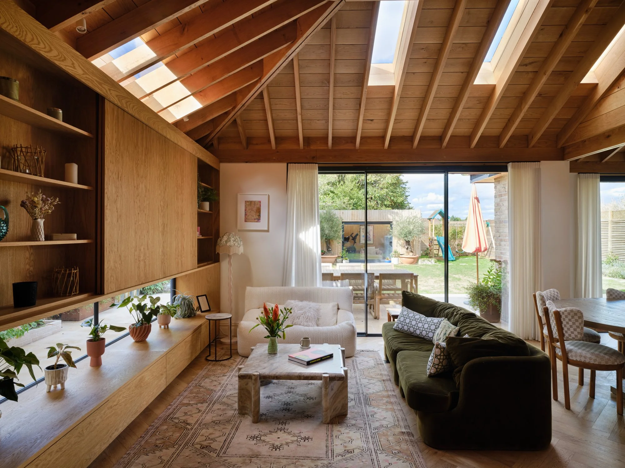 Oak-framed family living space with a vaulted roof and garden views, Cromwell Road, Teddington