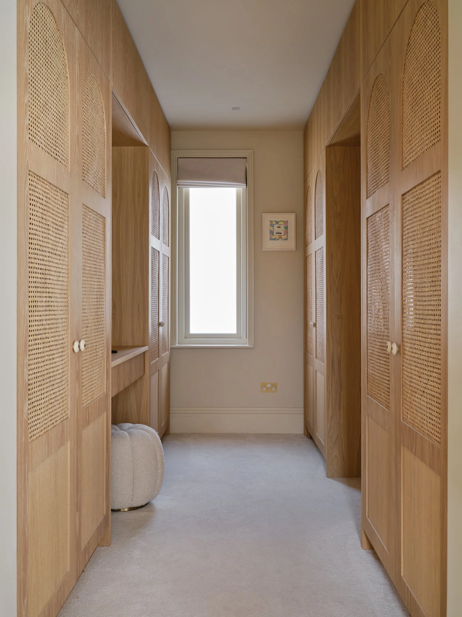 Walk-in wardrobe corridor lined with oak joinery, Cromwell Road, Teddington
