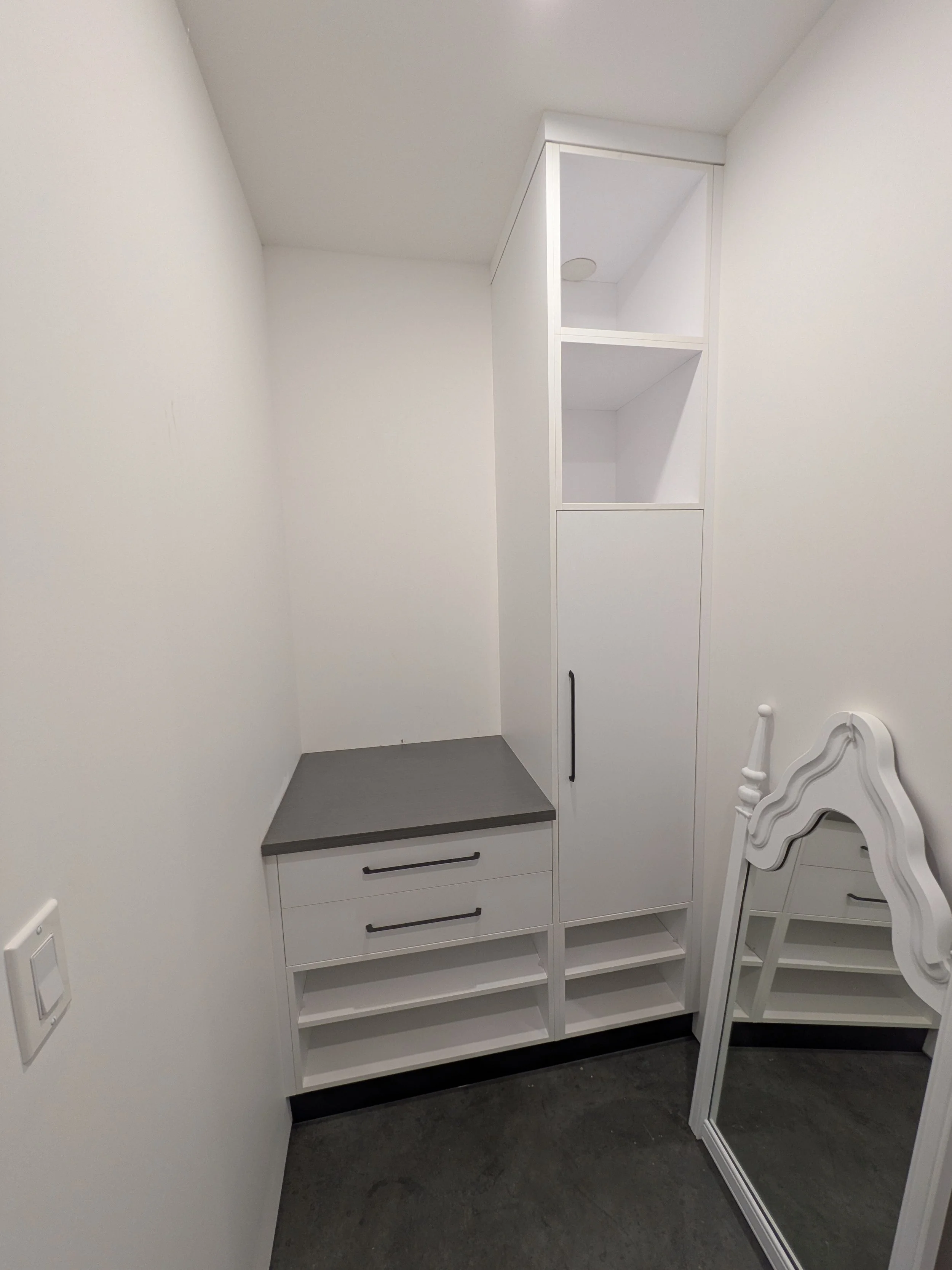 Mudroom from garage, shoe storage below