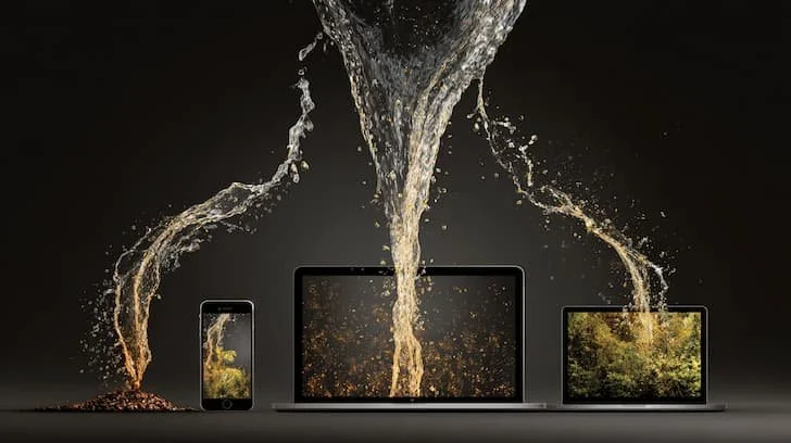 A photo of a desktop, phone, and ipad with watering streaming down connecting all 3 representing repurposing your content for wellness niches.