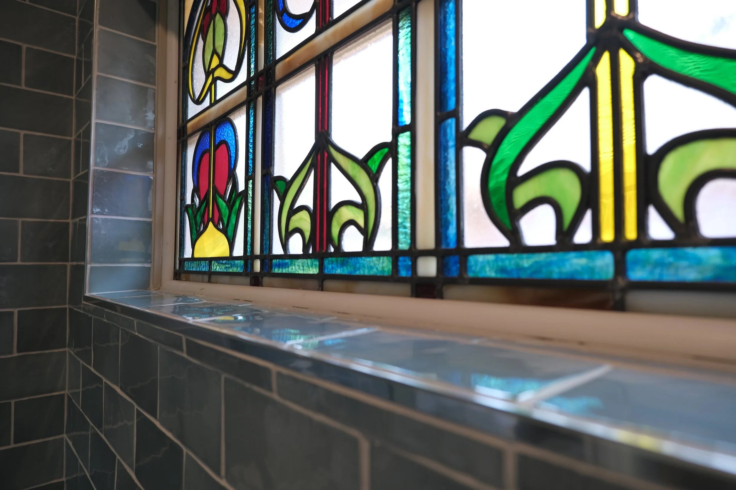 Original stained glass worked into the design