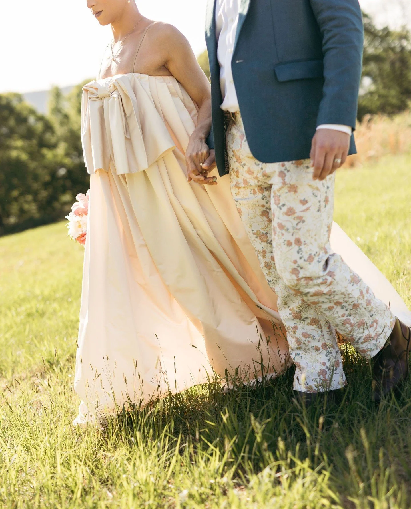 Details from Eliot &amp; Nick's elopement that made me audibly gasp ✨️😍 Swipe to the end for a friendly little surprise 🐛⁠
⁠
All-Queer Vendor Team 🌈⁠
Clothing designer: @timothywestbrook_ @tlbrookebridal ⁠
Rings: @automicgold⁠
Florals: @seasonsflo