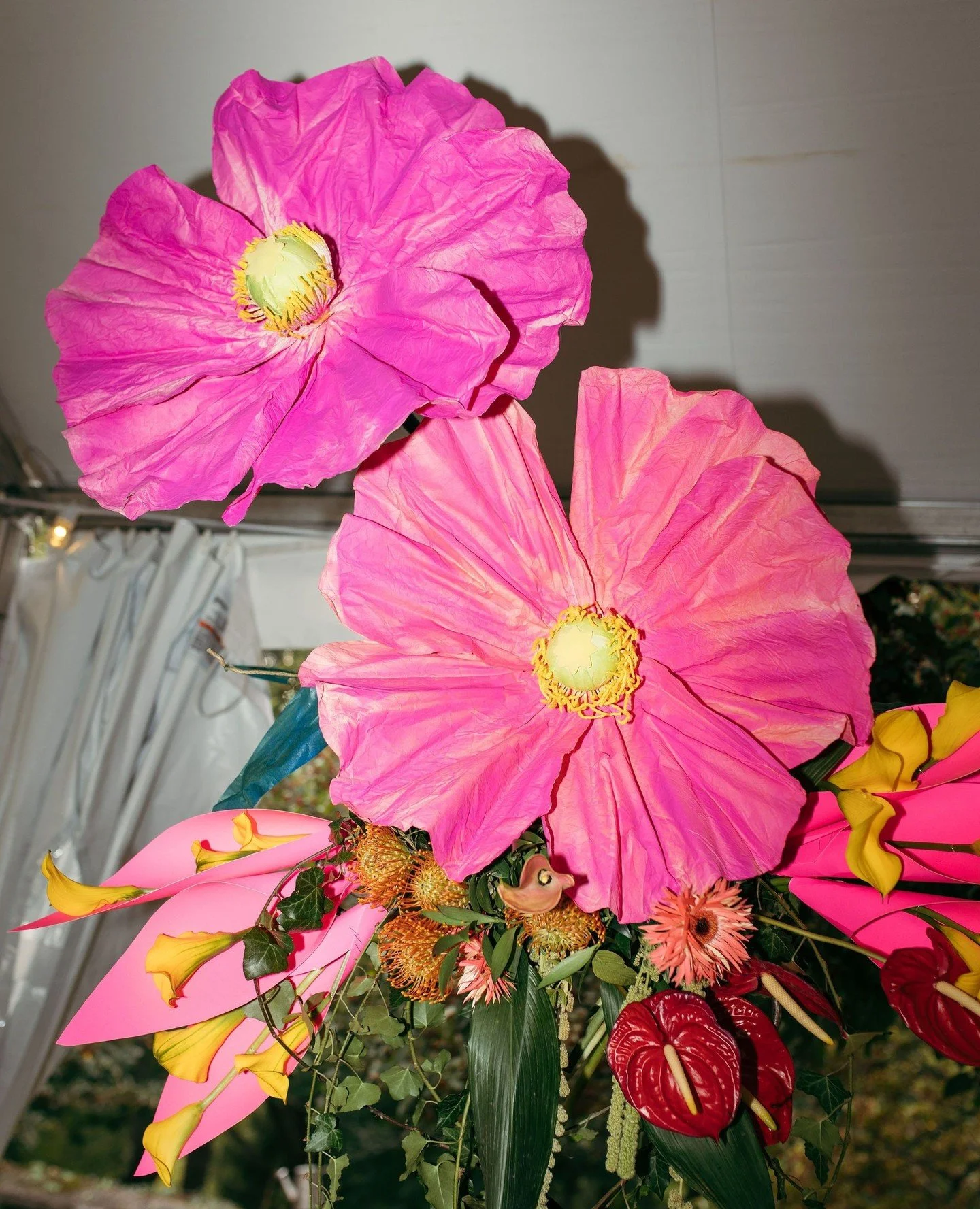 Whimsical vibrant florals at Eliot &amp; Nick's Hudson Valley reception at @goosefeatherny 🌺✨️ The team at @seasonsflowersnyc_official curated the perfect palette for this couple, which even matched the looks of some of the guests! So humbled to be 