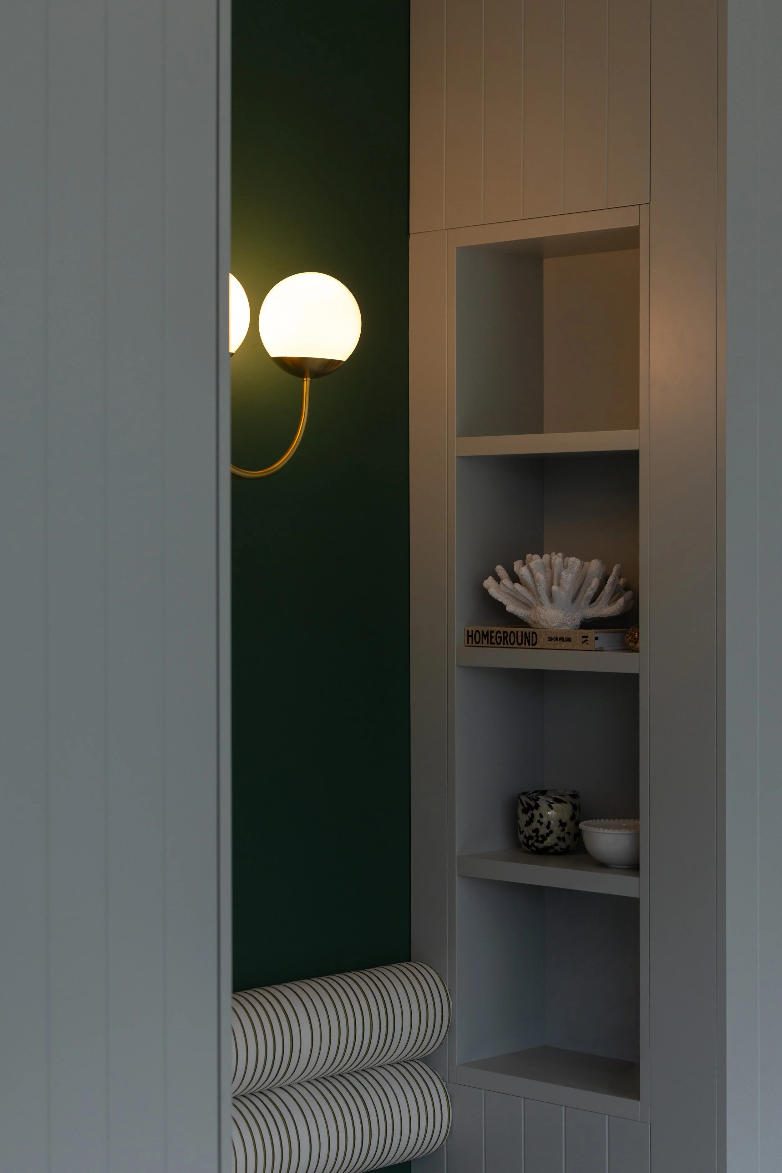 Hidden bookshelf with feature lighting