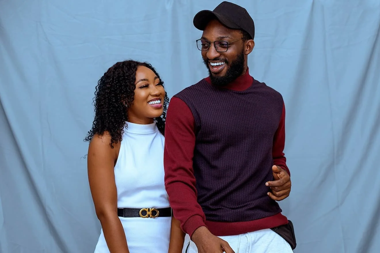 man-in-red-crew-neck-long-sleeve-shirt-beside-woman-in-white-crew-neck-shirt