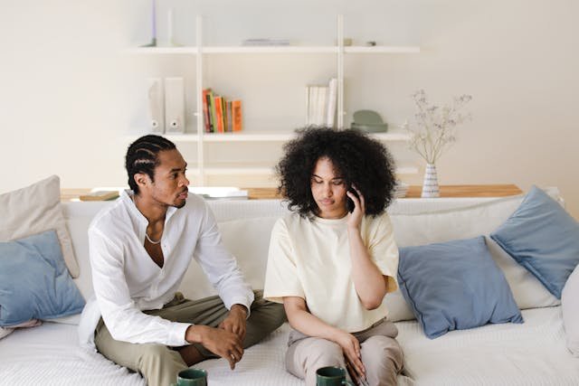 couple-sitting-on-a-couch