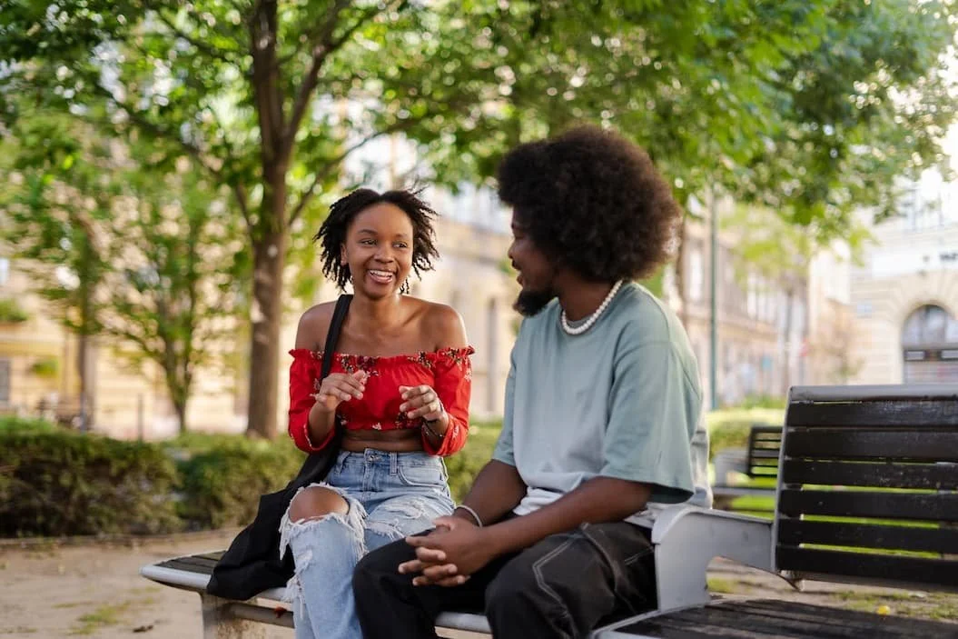 man-and-woman-talking-in-park
