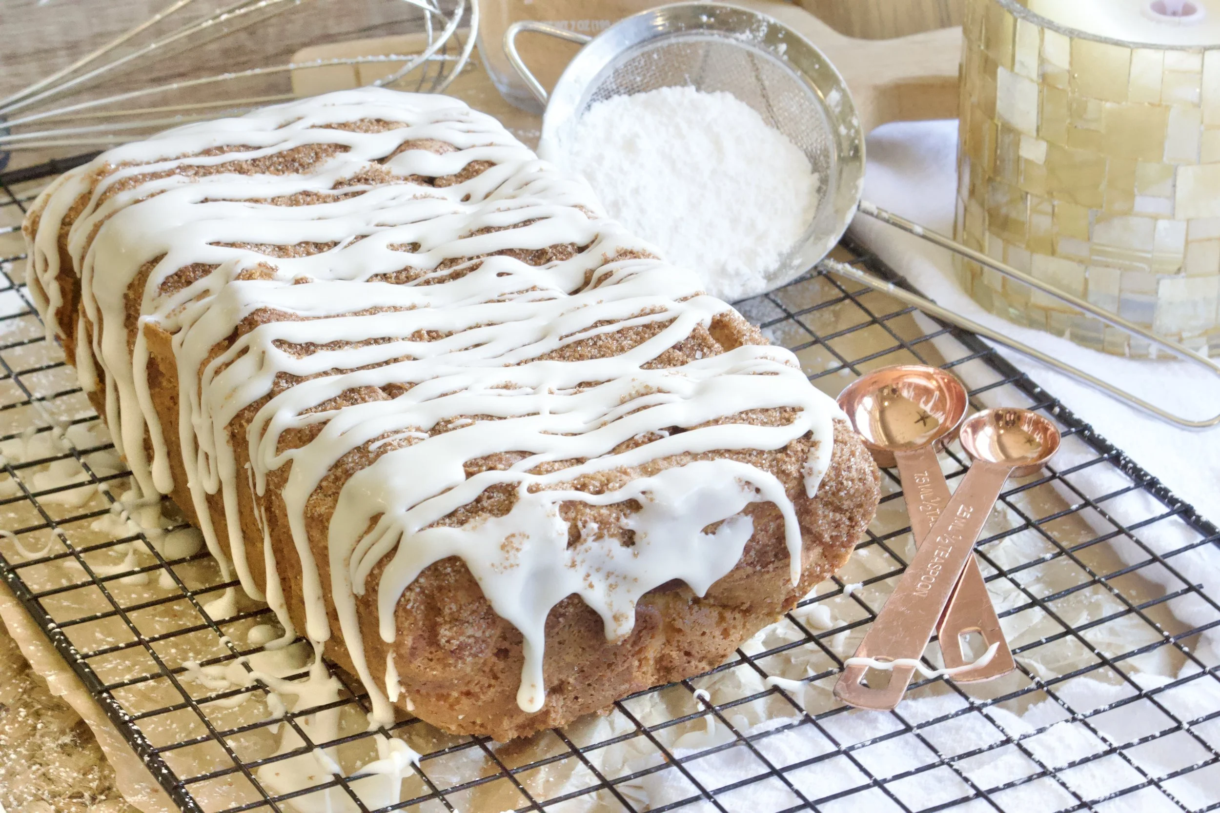 cinnamon bun loaf cake with vanilla icing