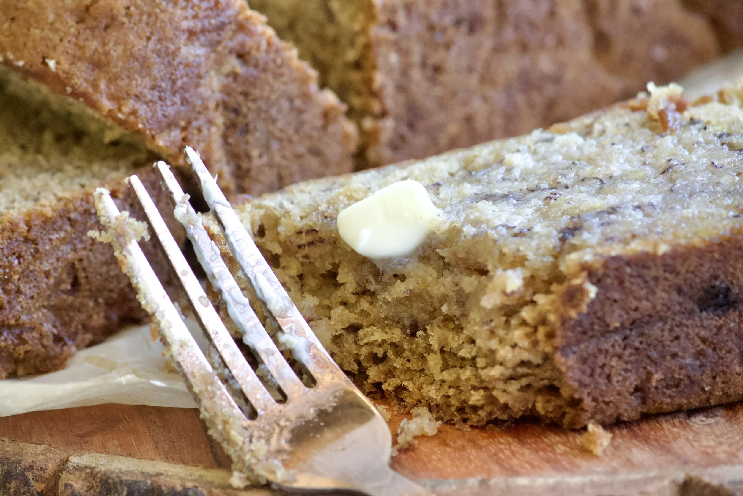 gluten-free banana bread with melted butter