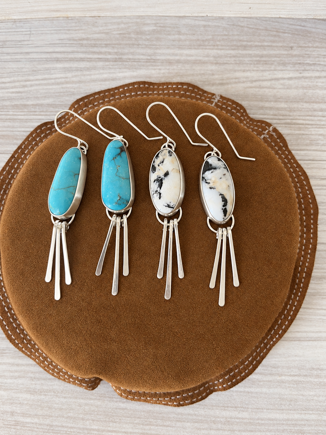 Turquoise and white stone drop earrings.png