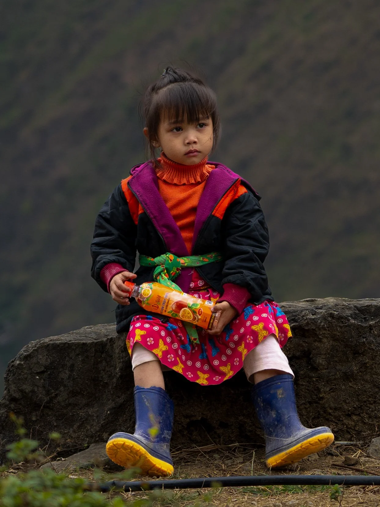 Young Girl on Side of Cliff - Ha Giang