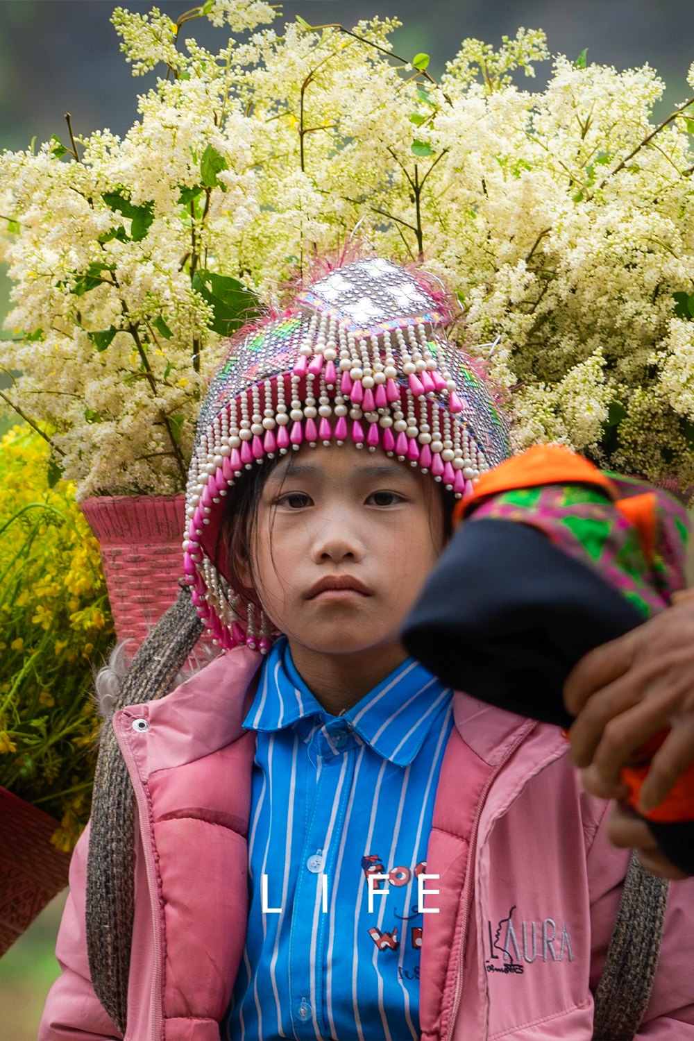 LIFE girl with flowers.png