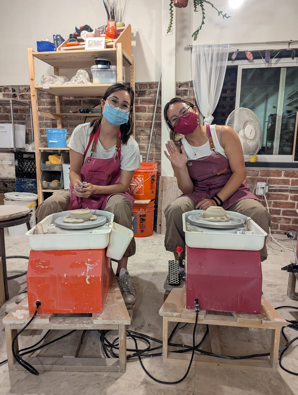  Friends hanging out in a pottery studio in the East Bay, friday night date night idea 