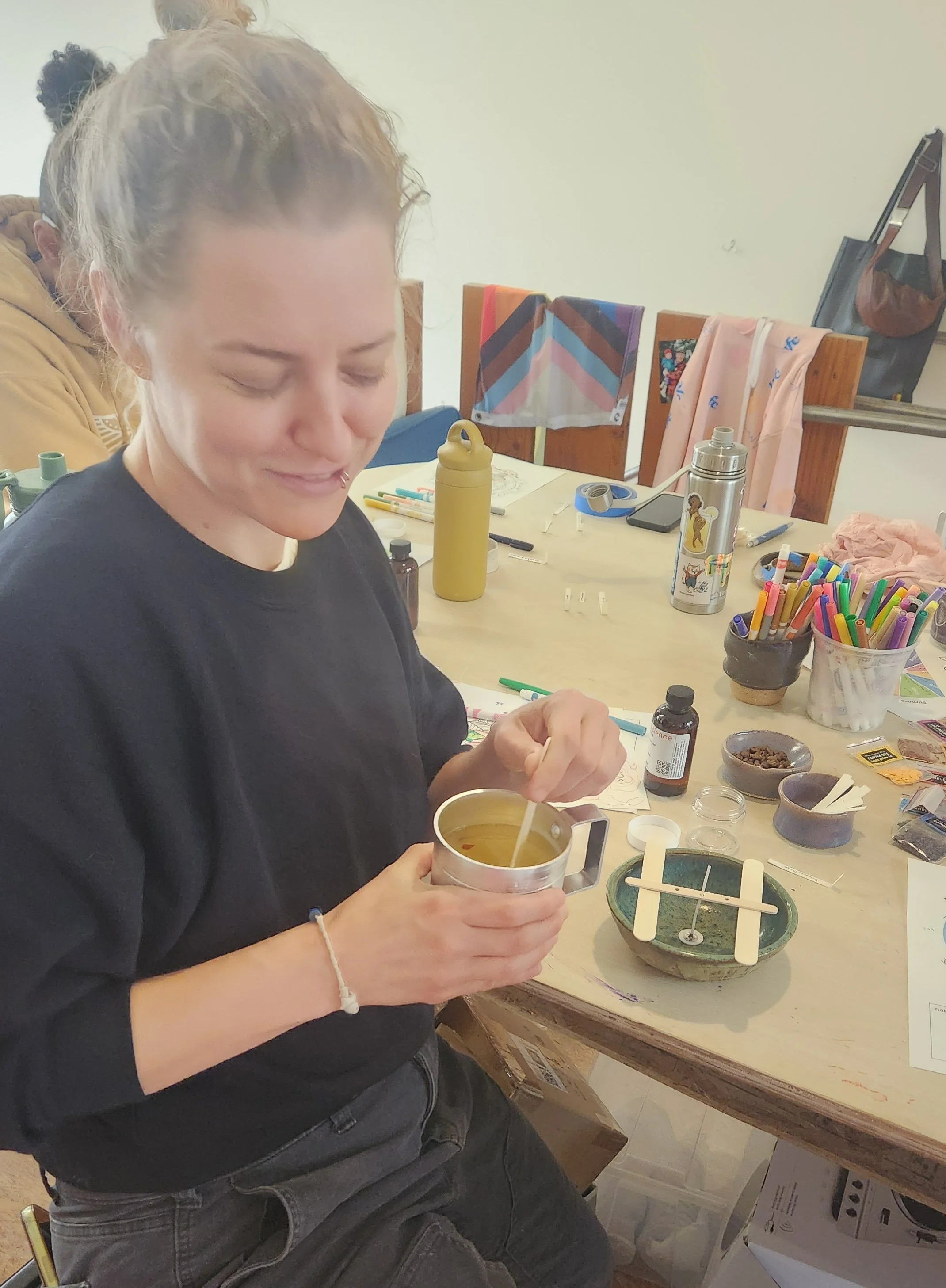  Beginner candle-making workshop with a student mixing wax and creating a memento honoring their dog 